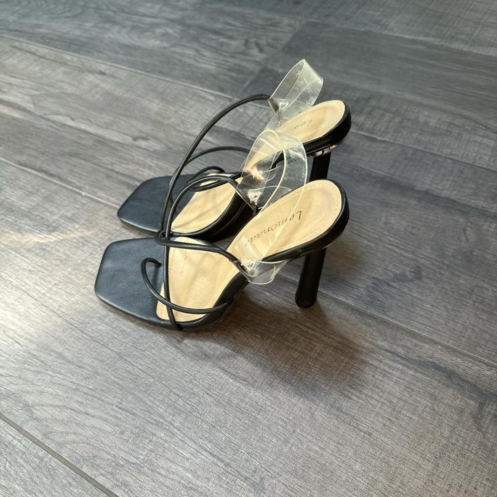 black strappy high heels. steve madden tagged for exposure